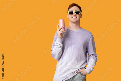 Young man in sunglasses wit...
