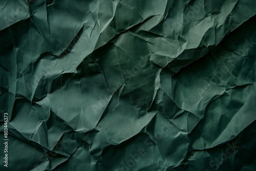 Dark Green Crumpled Paper Texture Background with Traces, Space for Text
