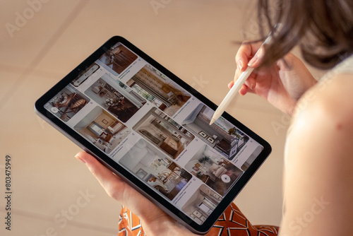 Architect using digital tablet in her work