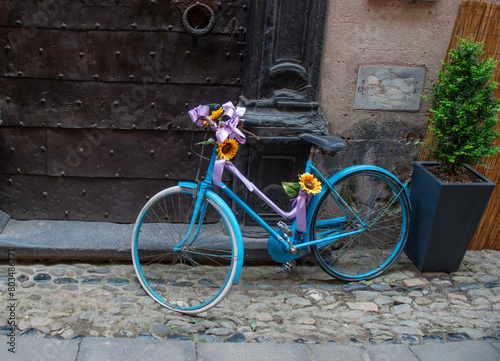 Vase of flowers placed on the bicycle