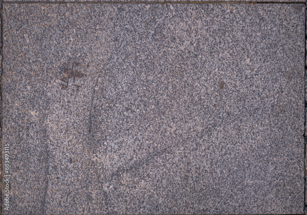 Fototapeta premium granite from a pedestrian street in Toruń