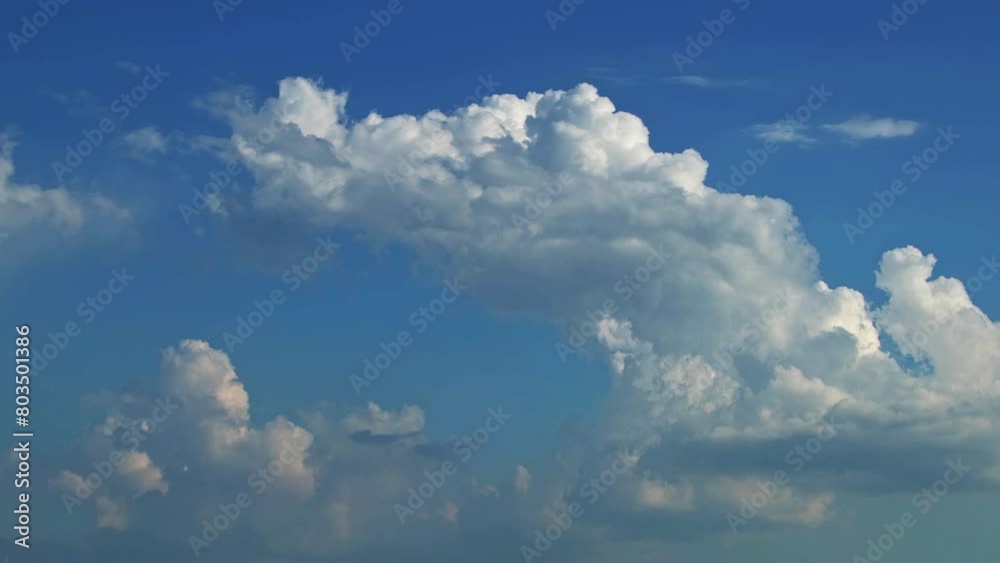 Soft White Rain Clouds Moving on Blue Sky Footage. Soft White Rain Clouds Moving on Blue Sky Footage.