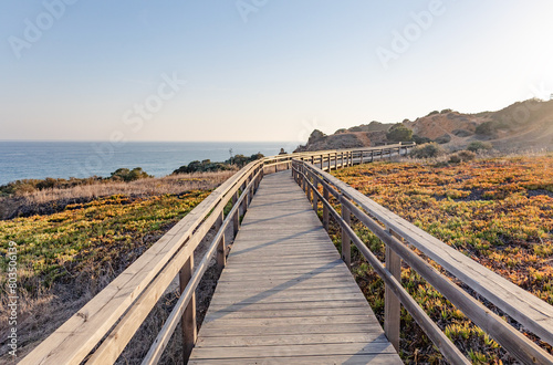 Boardwalk walkway in Lagos, Algarve, Portugal. October 10, 2023. © Ekaterina
