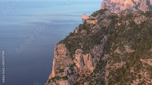 seaside cliff basking in warm glow of sunset dBeautiful aerial view flight rone photo