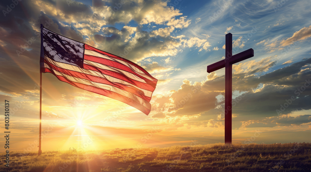 A cross is in the foreground of a sunset with an American flag in the background