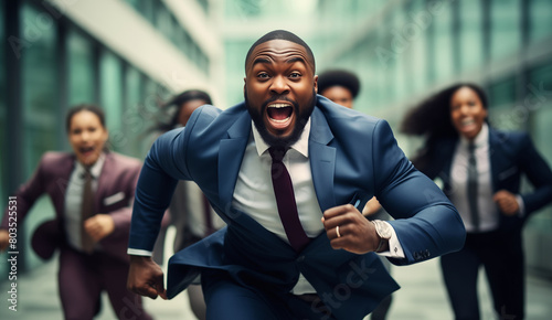 Running joyful black businessman with colleagues business people having race together in the office photo