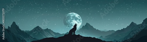 The full moon rises over the mountains as a lone wolf howls into the night photo