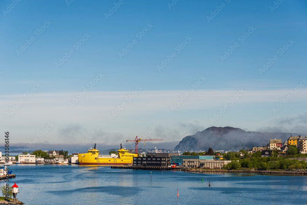 view of the city of Alesund shrouded in fog, Norway