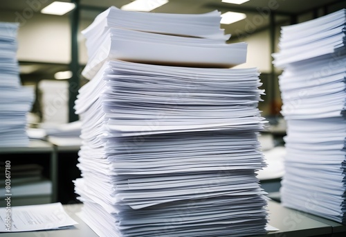 Stack of paper in office. Busy work, high pressure, work. Study.  © Gia