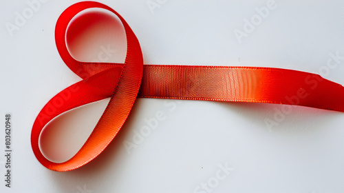 red ribbon on a black background