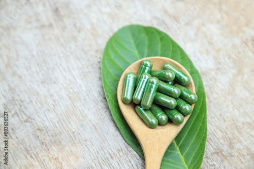 Green herbal capsules from herb for healthy eating in daily life