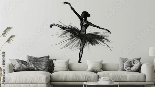  A graceful ballerina captured in a black sketch on a white living room wall