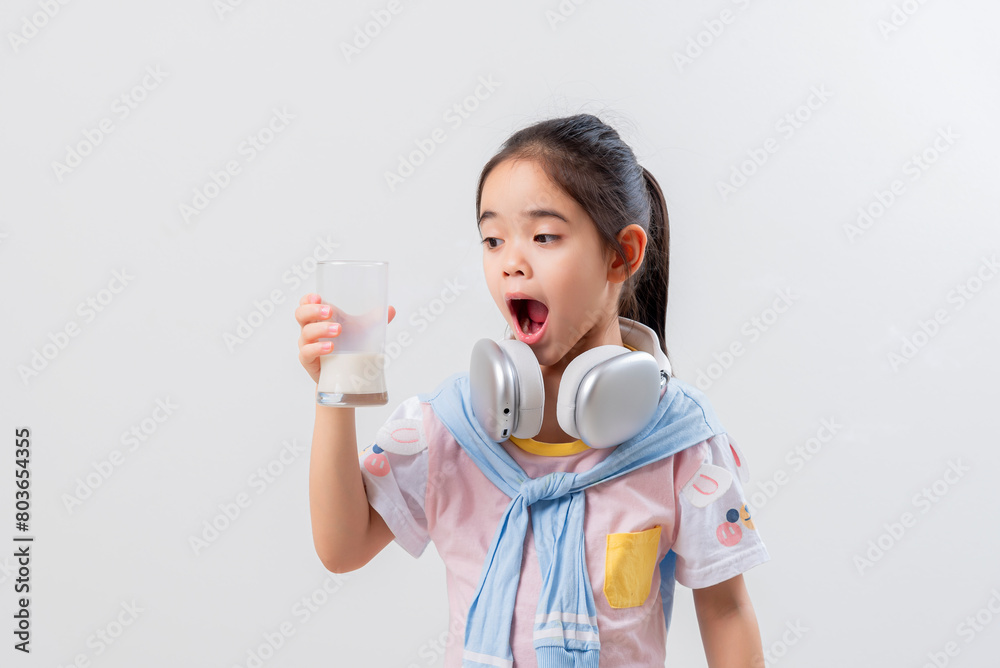 Little Asian girl Image of Asian child drinking milk Little Asian girl Image of Asian child drinking milk