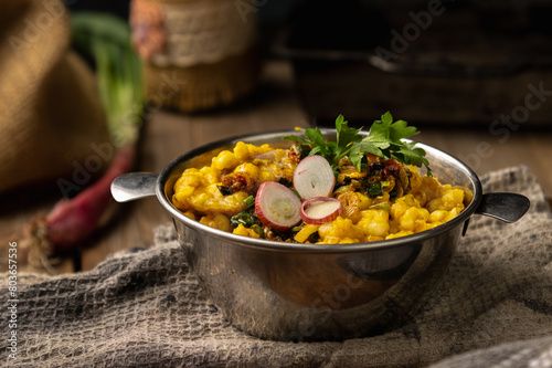 photography of locro, traditional Argentine food to celebrate national days with worker's day, May 25, July 9, with corn beans pig's feet meat pumpkin