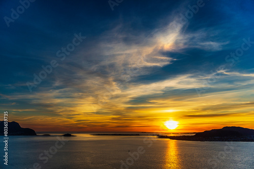  top view of a sunset over The city of Alesund and the sea during a sunny evening  Norway