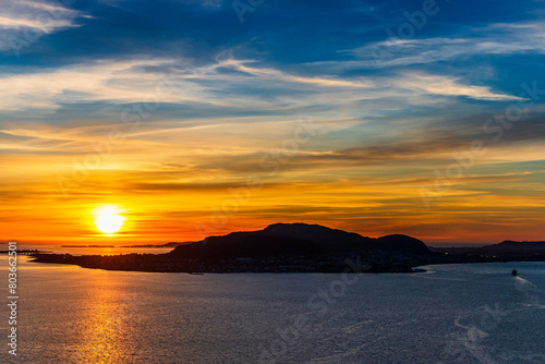  top view of a sunset over The city of Alesund and the sea during a sunny evening  Norway