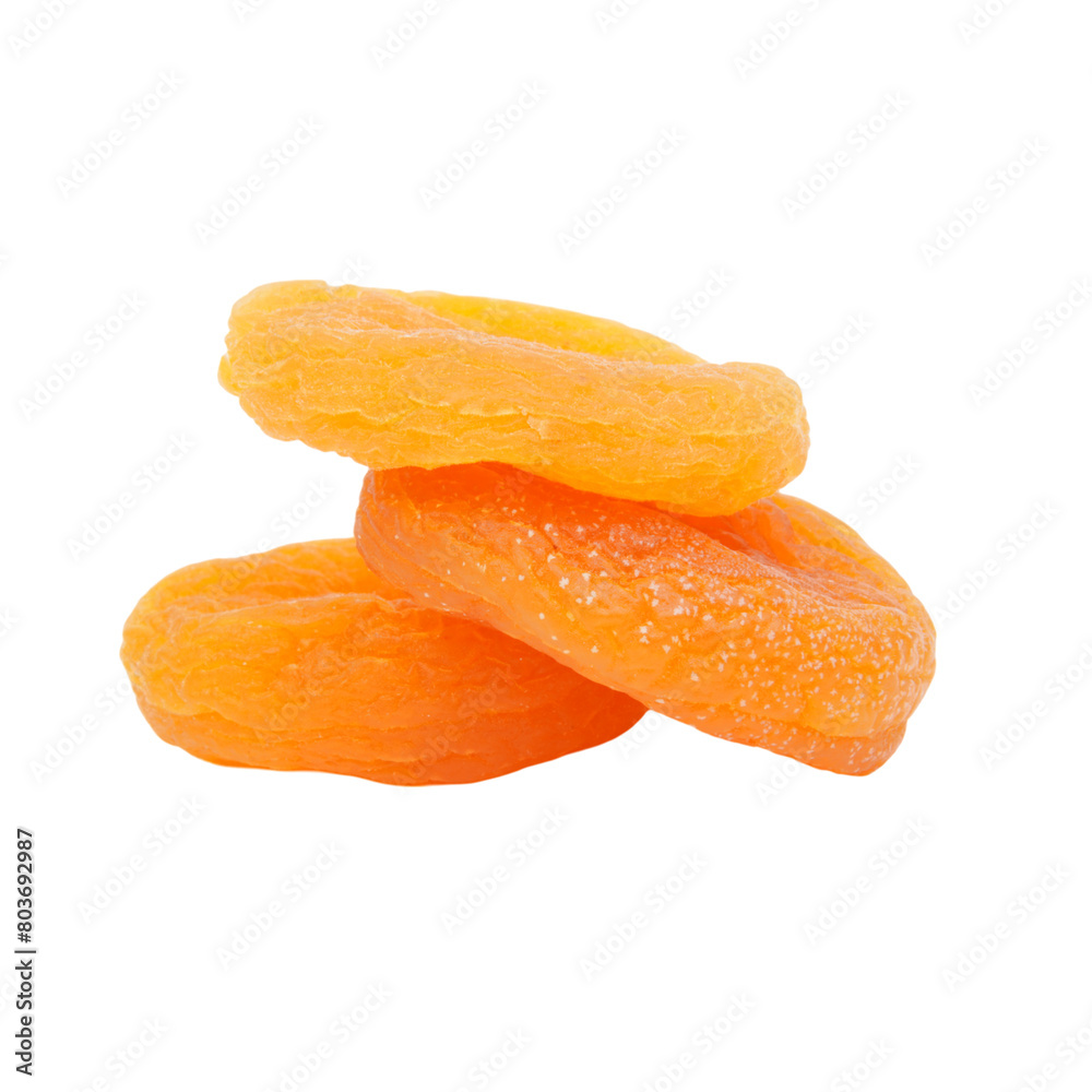 Closeup of three sweet dried apricots isolated transparent Closeup of three sweet dried apricots isolated transparent