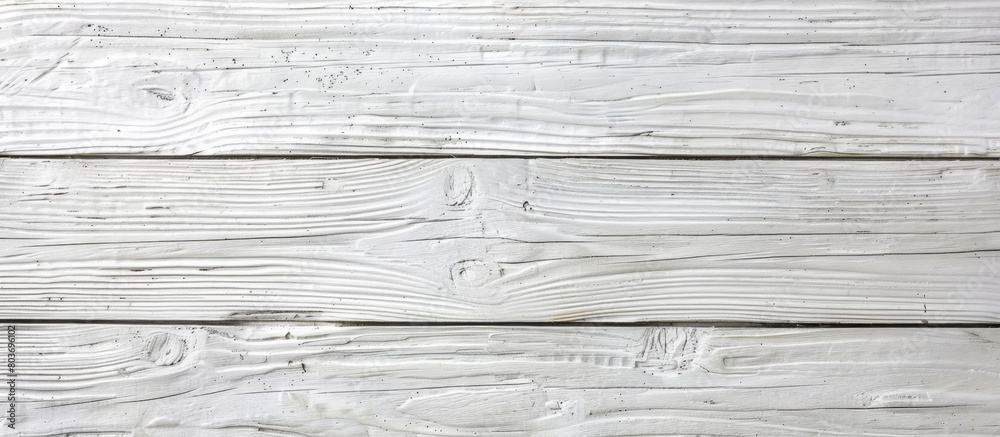 Obraz premium A detailed view of a white painted wood wall complemented by a wooden floor, showcasing a clean and minimalist design