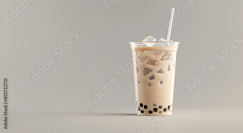 Milk tea and tapioca balls in a transparent glass. Iced boba milk tea, summer drink on flat light background with copy space, banner template