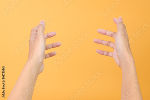 Wallpaper Mural Close up of two female hands reaching and holding for first person point of view Torontodigital.ca