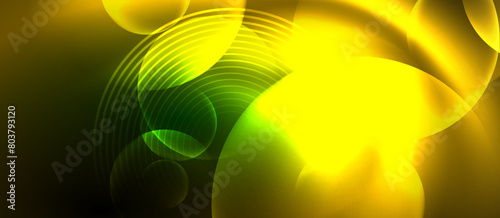 A stunning closeup of a glowing yellow and green circle on a dark background, resembling a terrestrial plant. The electric blue liquid creates an artistic pattern in this macro photography shot