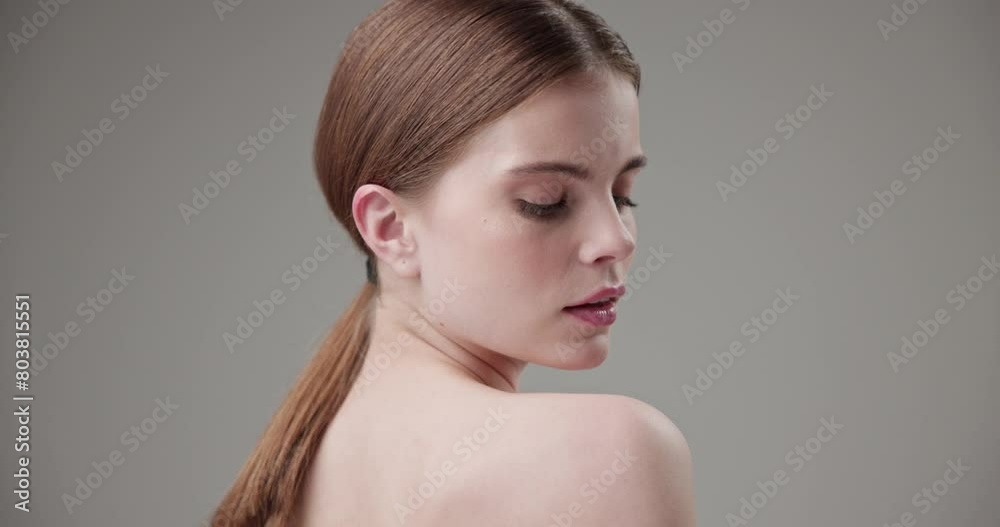 Beauty, health, cosmetics, anti-aging therapy and skin care concept - young beautiful brunette Caucasian woman posing and looking at the camera with a calm confident look Beauty, health, cosmetics, anti-aging therapy and skin care concept - young beautiful brunette Caucasian woman posing and looking at the camera with a calm confident look