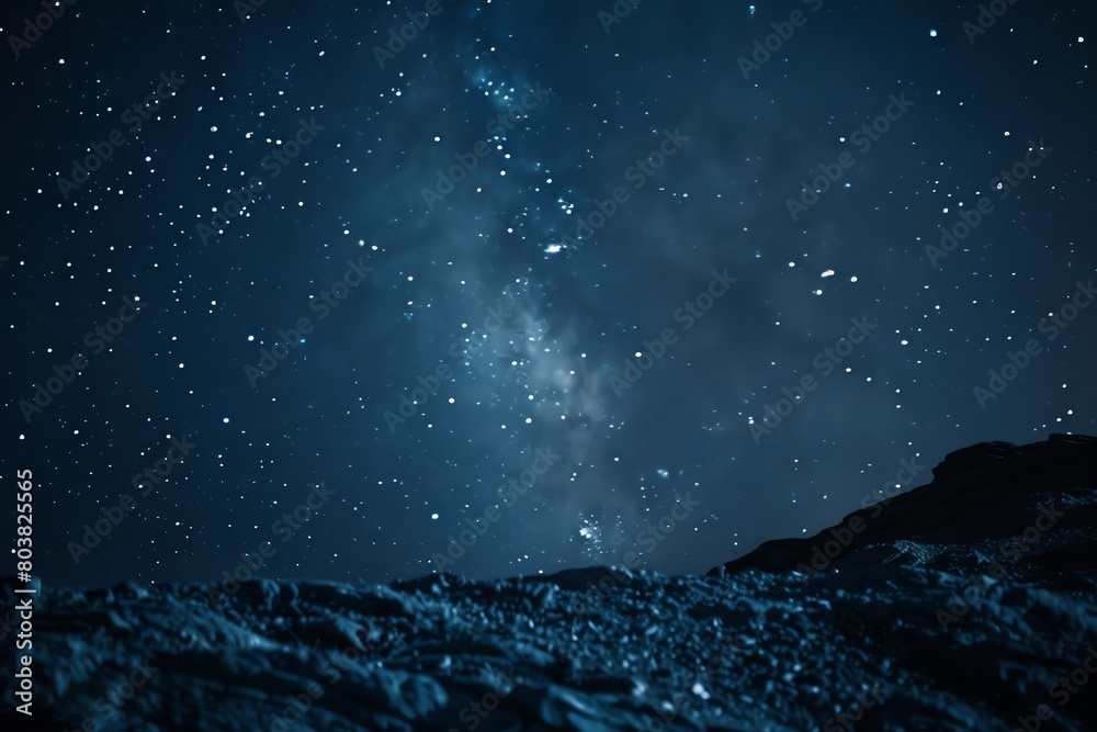 Serene stock photo of a clear night sky viewed from atop a mountain, with the galaxys core visible, emphasizing tranquility and exploration Serene stock photo of a clear night sky viewed from atop a mountain, with the galaxys core visible, emphasizing tranquility and exploration