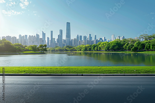 High resolution photorealistic of beautiful city skyline with green park and lake in front, clear blue sky, empty asphalt road on the right side, daylight, bright sunny day, high detail, high quality