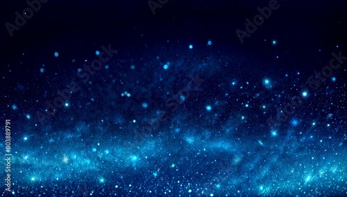 Sparkling Blue Bokeh on Dark Background with Glitter Overlay