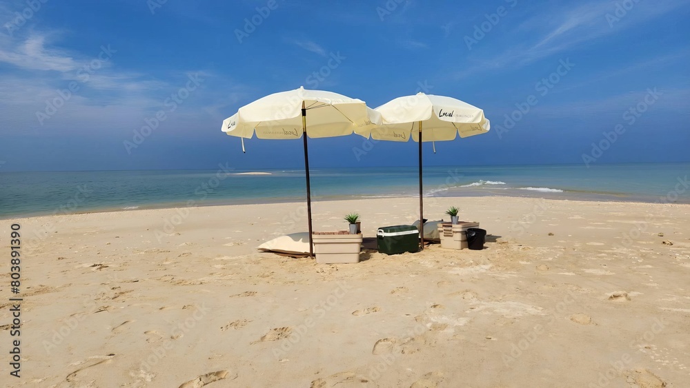 photo of crashing waves on the shoreline, umbrella and chairs on the beach photo of crashing waves on the shoreline, umbrella and chairs on the beach