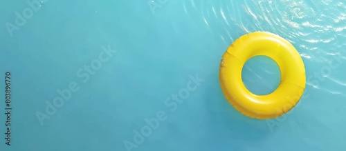 Yellow ring buoys in swimming pools in summer photo