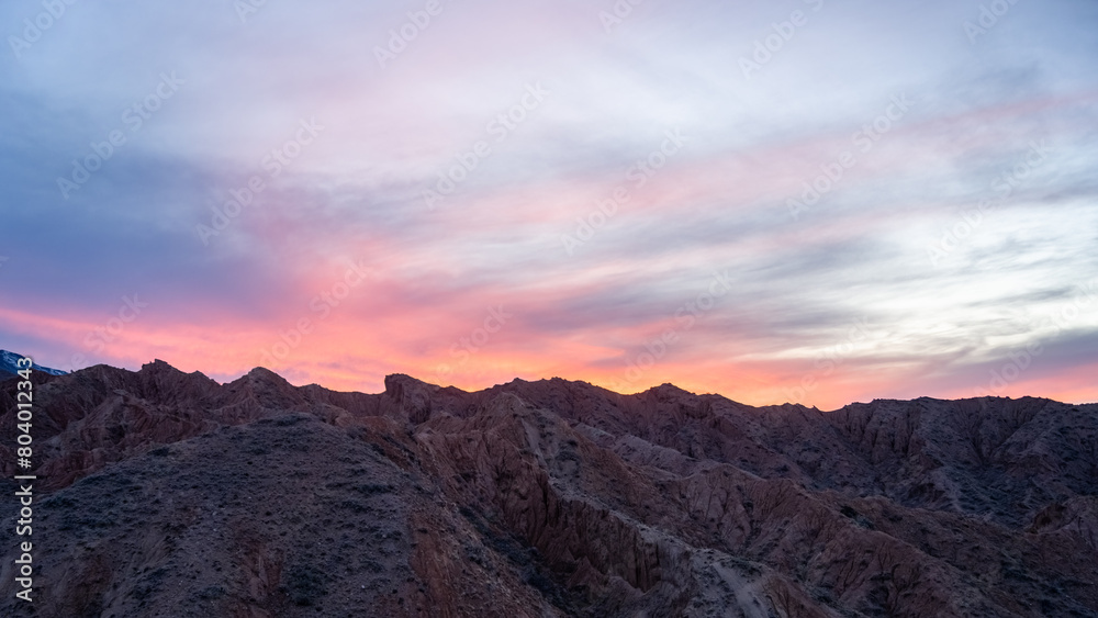 beautiful pink sunset in the mountains. Dawn in the mountains