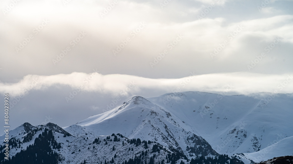 winter in the mountains. snowy mountain peaks winter in the mountains. snowy mountain peaks