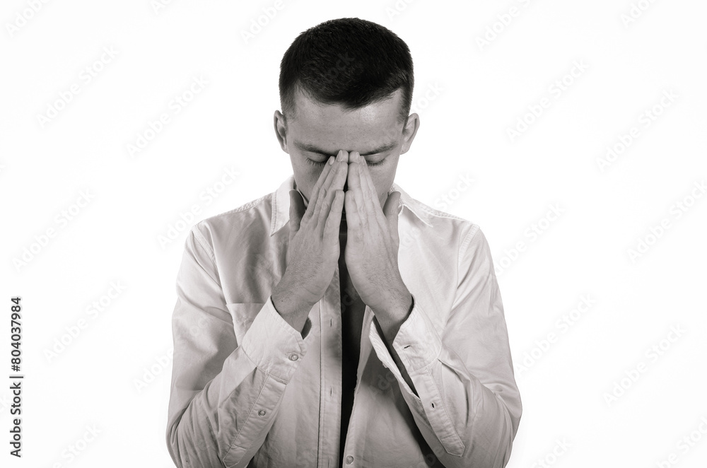 Young attractive man with a headache. Problems and depression. Young attractive man with a headache. Problems and depression.