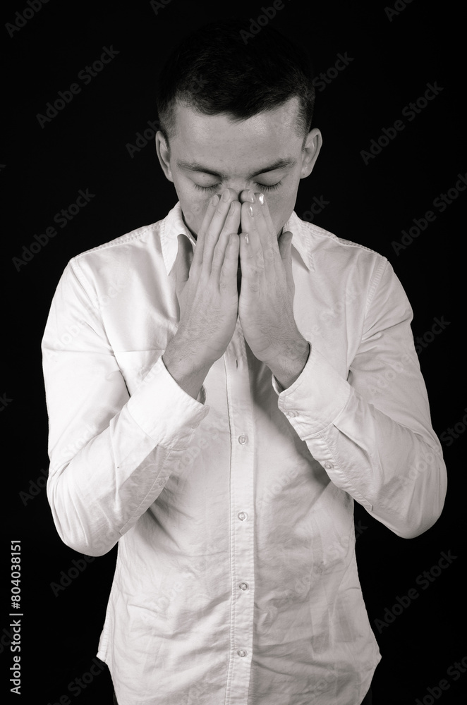 Young attractive man with a headache. Problems and depression. Young attractive man with a headache. Problems and depression.