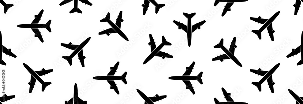 Many airplanes on a white background, seamless pattern. World travel and transportation. Many airplanes on a white background, seamless pattern. World travel and transportation.