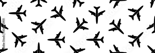 Many airplanes on a white background, seamless pattern. World travel and transportation.