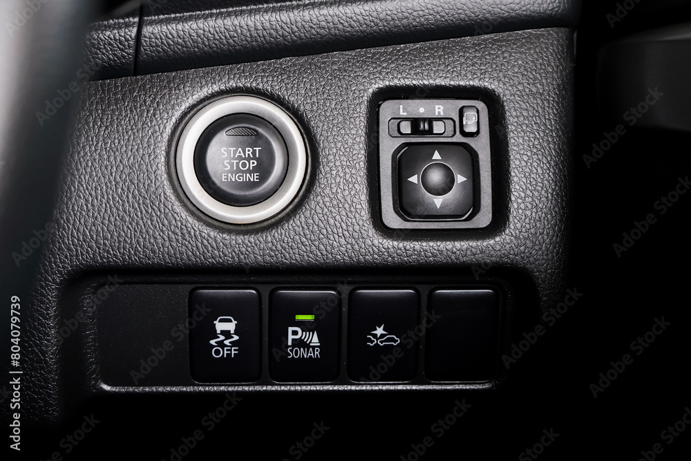 Close up engine car start button. Start stop engine modern new car button,Makes it easy to turn your auto mobile on and off. a key fob unique ,selective focus