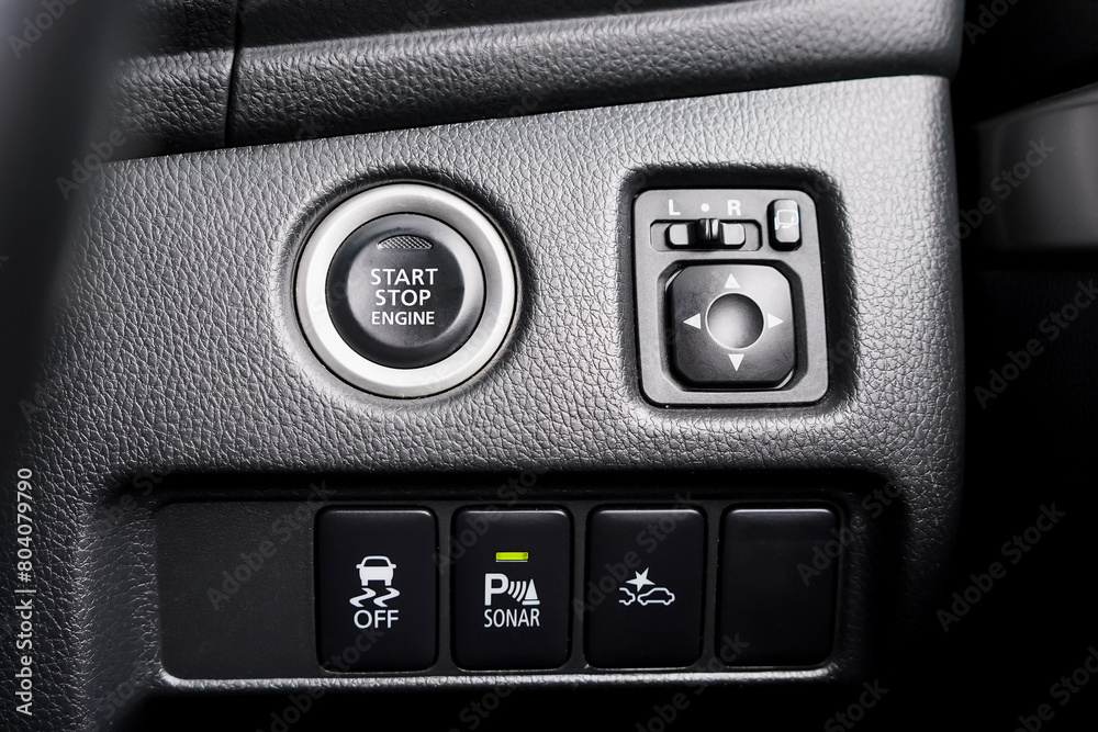 Close up engine car start button. Start stop engine modern new car button,Makes it easy to turn your auto mobile on and off. a key fob unique ,selective focus