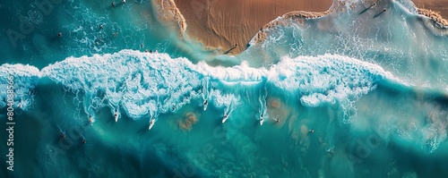 Aerial view of surfers riding waves at Ditch Plains Beach, Montauk, New York, United States. photo