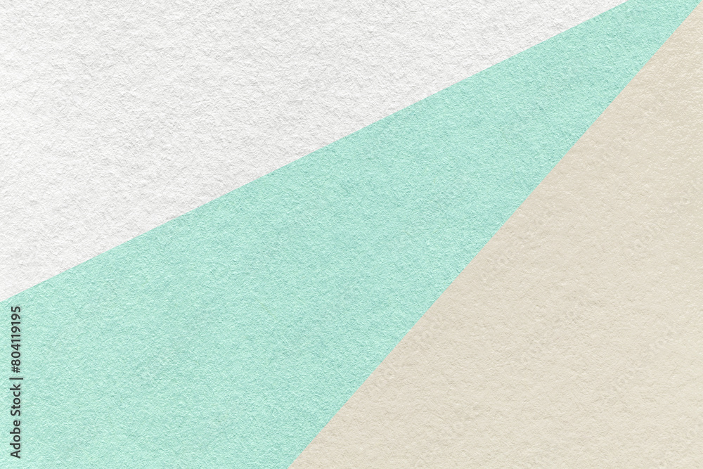 Texture of old craft light cyan, beige and white color paper background, macro. Vintage abstract cardboard Texture of old craft light cyan, beige and white color paper background, macro. Vintage abstract cardboard