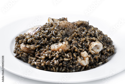Black rice with seafood isolated on white background
