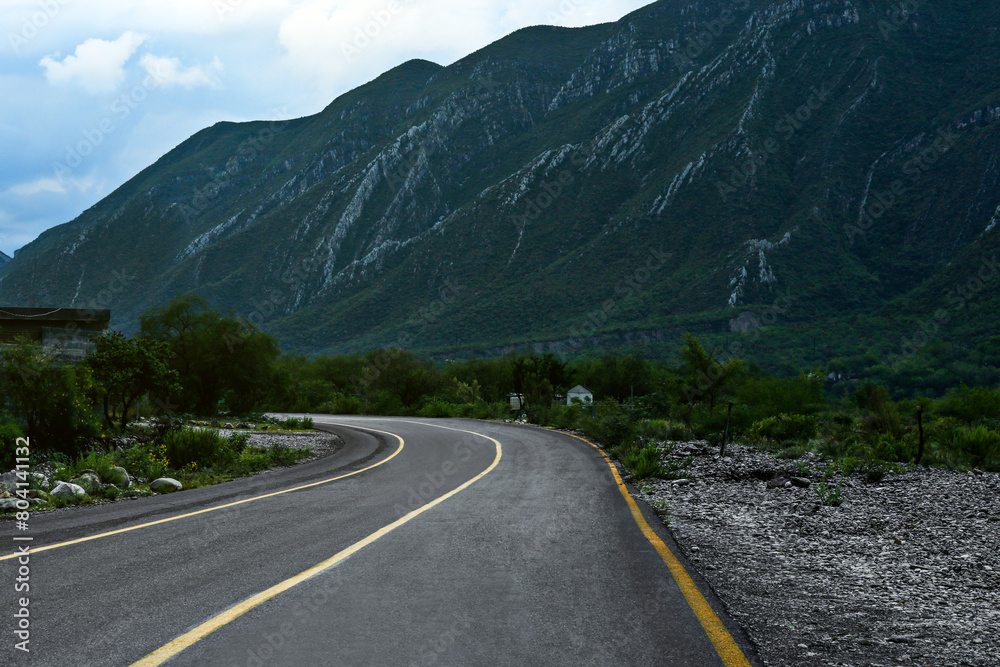 Fototapeta premium Empty asphalt road in mountains. Picturesque landscape