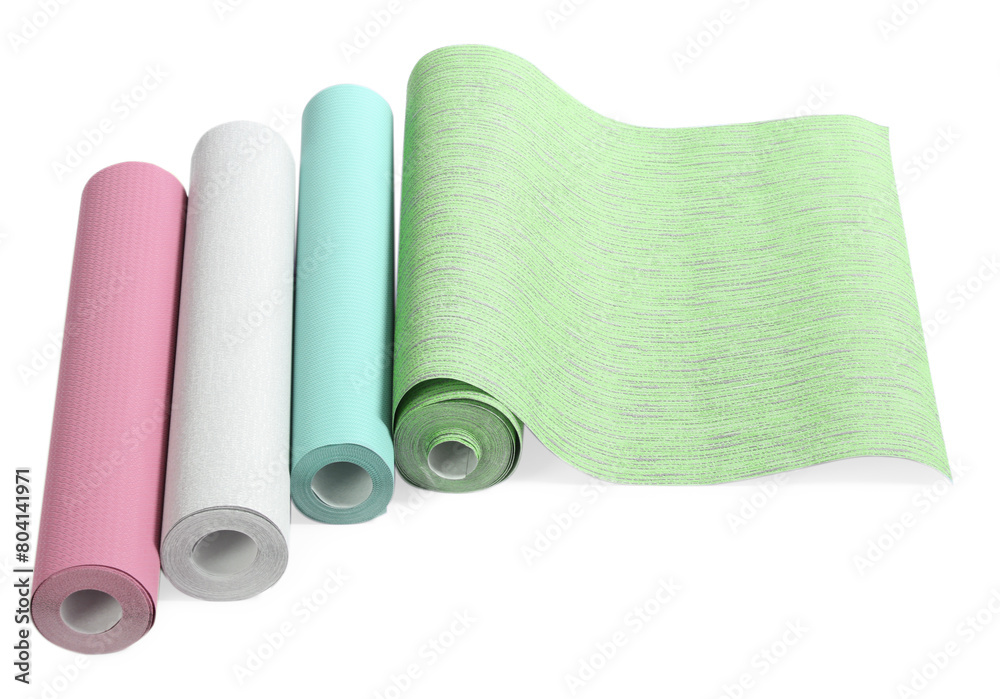 Different colorful wallpaper rolls isolated on white Different colorful wallpaper rolls isolated on white