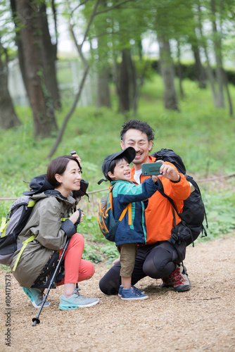 Families enjoying outdoor adventures such as climbing  hiking  trekking  etc. Photography Families taking selfies together