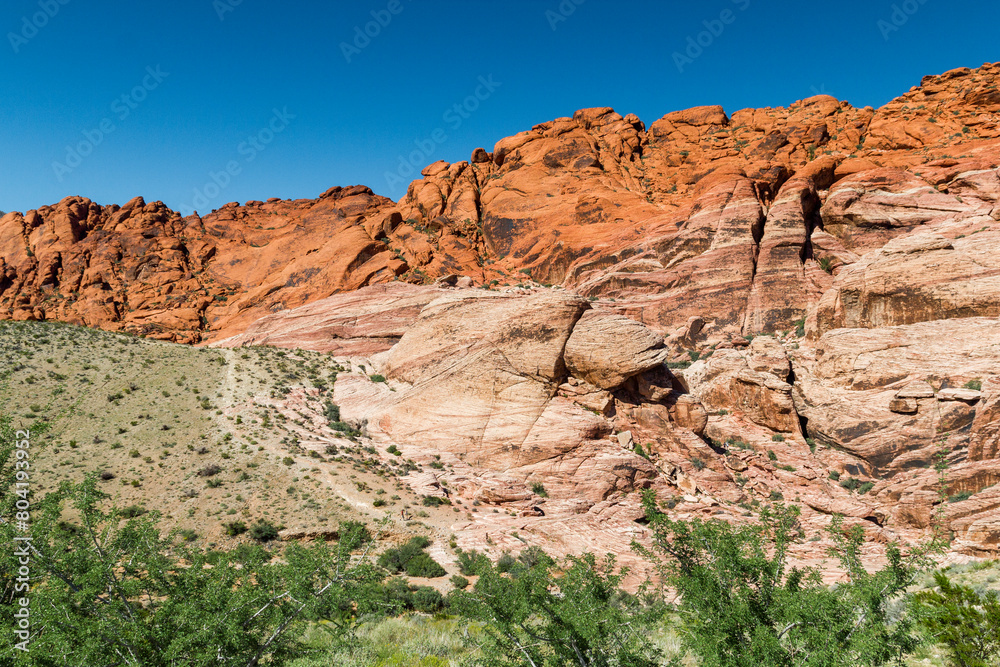a view to the colorful red and yellow shining rock formations in the Red rock Canyon, Nevada 