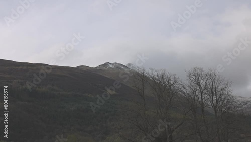 Hand-held shot of the snowy beinn a bheithir munro in the Scottish highland photo