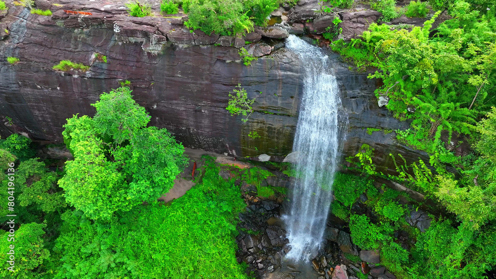 Pha Luang Waterfall: A pristine natural wonder nestled in lush forests, this breathtaking cascade enchants with its crystal-clear waters and serene surroundings. Nature and travel concept. Thailand.
Pha Luang Waterfall: A pristine natural wonder nestled in lush forests, this breathtaking cascade enchants with its crystal-clear waters and serene surroundings. Nature and travel concept. Thailand.