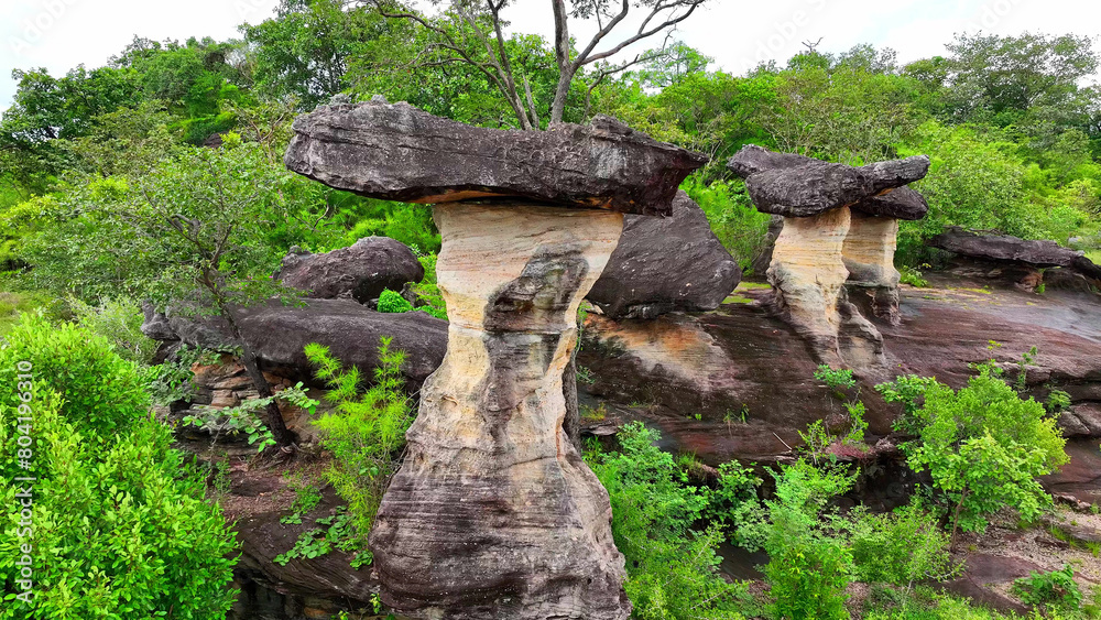 Sao Chaliang in Pha Taem National Park, Thailand, captivates from above with its unique rock formations and scenic landscapes. Geological and nature concept.
Sao Chaliang in Pha Taem National Park, Thailand, captivates from above with its unique rock formations and scenic landscapes. Geological and nature concept.