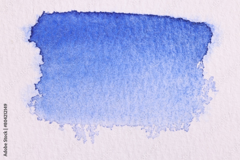 Abstract blue watercolor painting on white paper, top view Abstract blue watercolor painting on white paper, top view
